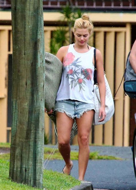 margot robbie bikini pics|Margot Robbie surprises in bikini top and flares